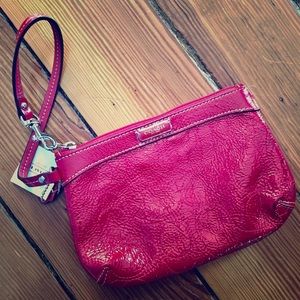 Coach wristlet in red patent leather